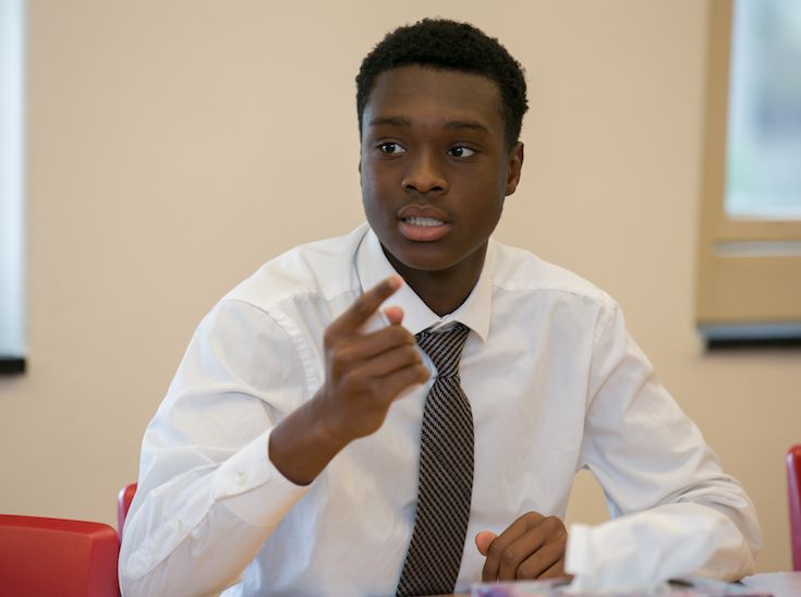 confident student defends his postion